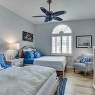 Bedroom with blue fan